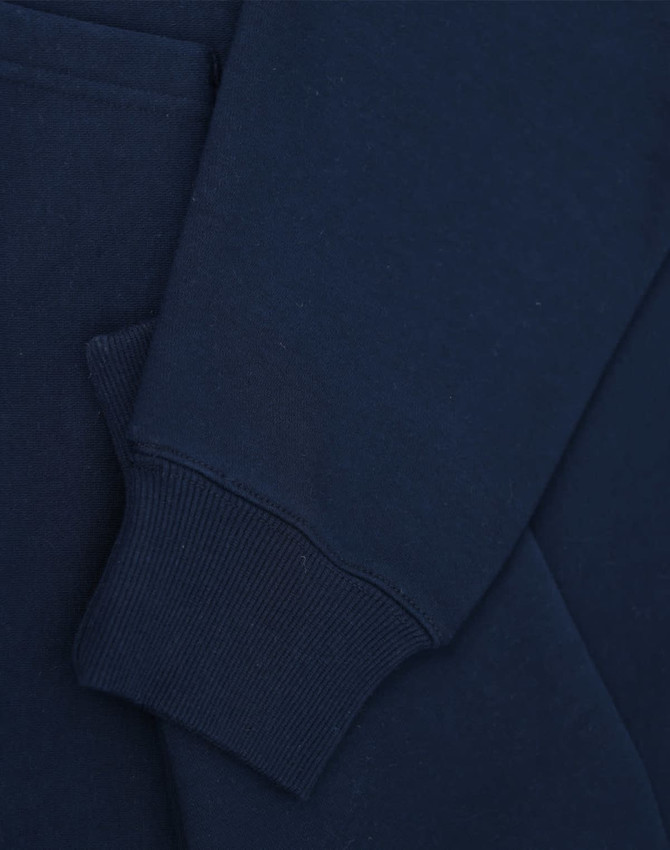 A navy unisex premium fleece oversized hoodie with a cuff and pocket detail. Features a logo.