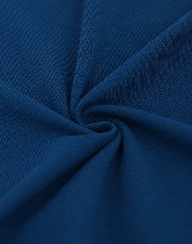 A close-up view of a deep navy blue cotton/polyester fabric, showcasing its smooth texture and folded appearance.