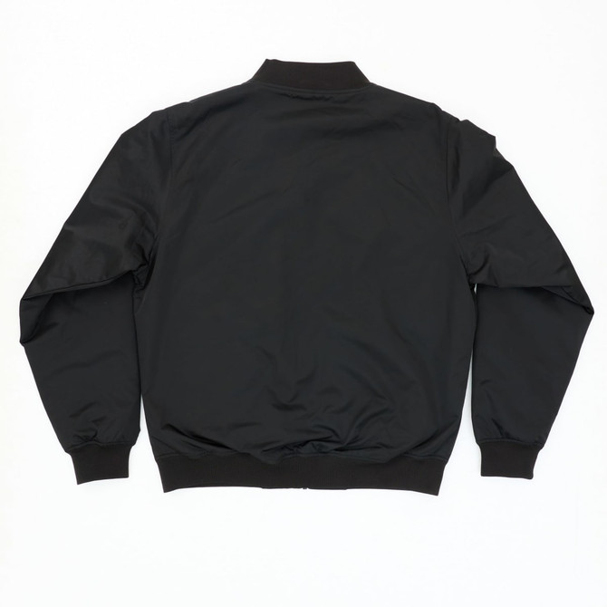 A black bomber jacket with a simple design, featuring a collar and long sleeves. It has a logo on the back.