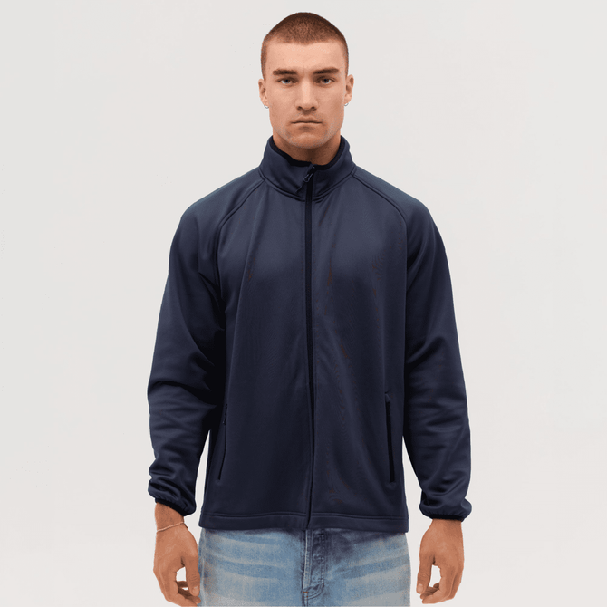 A navy Summit Bonded Jacket on a male model, featuring a zip front and a collar, with a logo.