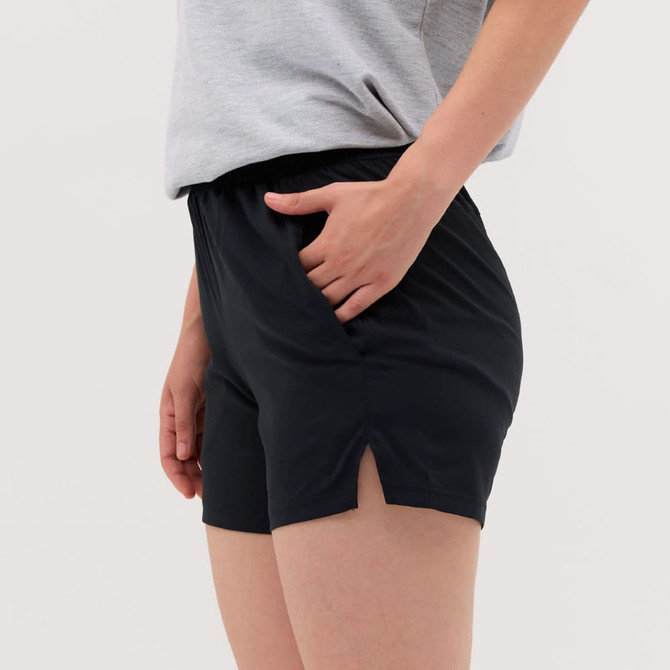Black running shorts with side slits, featuring a relaxed fit and an elastic waistband.