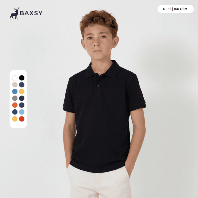 A navy polo shirt for youth, featuring a collar and short sleeves. It has a logo and is available in multiple colours.