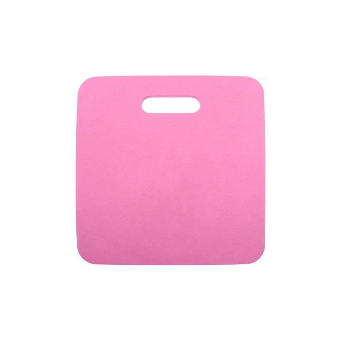 A pink stadium seat cushion with a handle, featuring a smooth surface and square design.