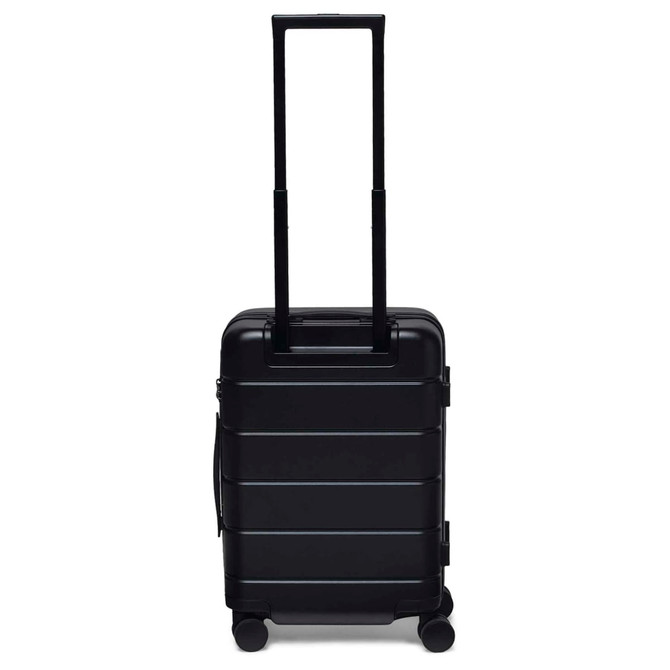 A black hardcase trolley with a retractable handle and wheels for easy transport. It features a logo.