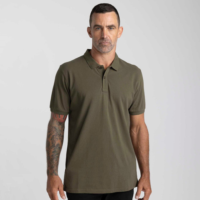 A men's polo shirt in olive green with a collar, short sleeves, and a fitted design. It features a logo.