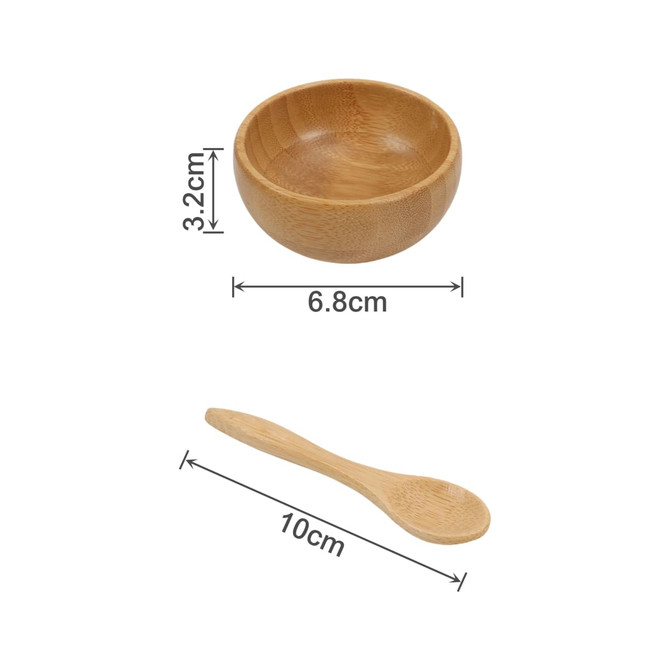A bamboo facial mask bowl set featuring a round bowl and a matching spoon, both in natural bamboo colour.