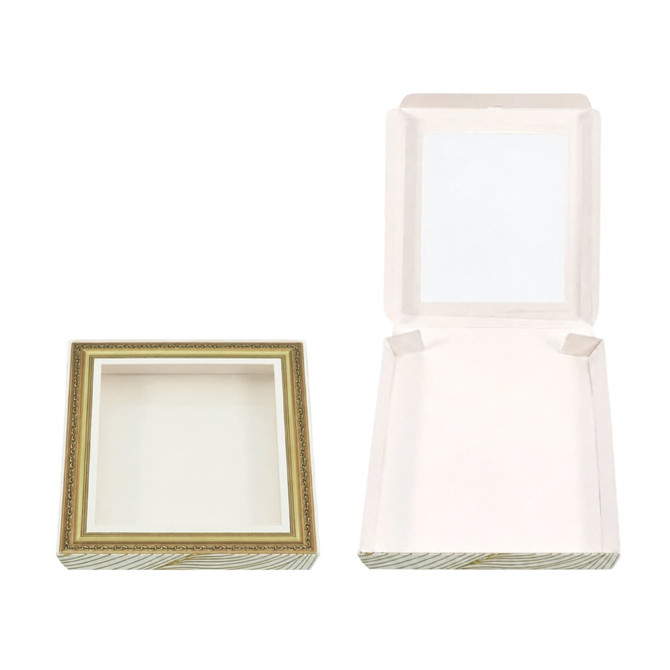 A square, gold-accented gift box with a removable lid, featuring a plain, white interior.