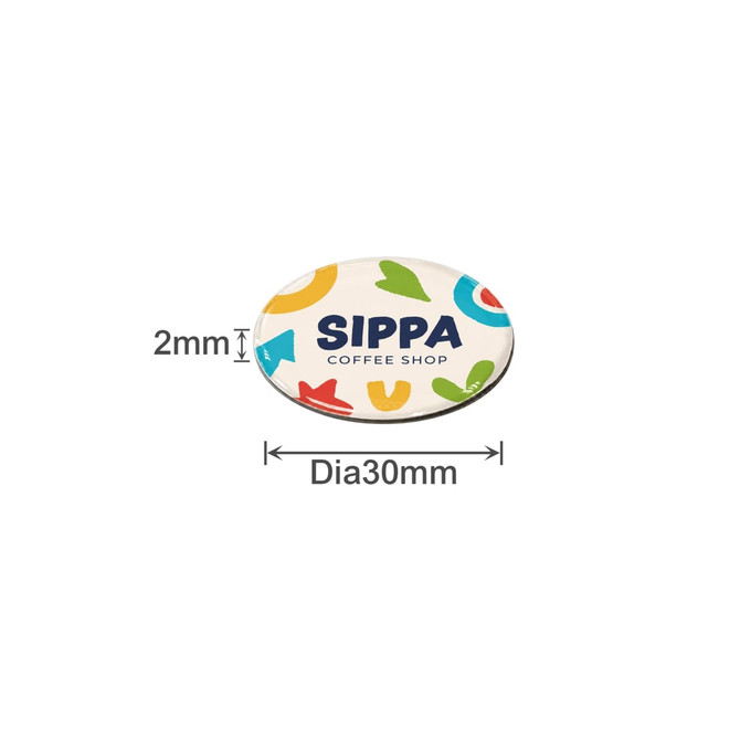 A round, 30mm epoxy sticker with a colourful design and a logo, featuring various shapes and a coffee shop name.