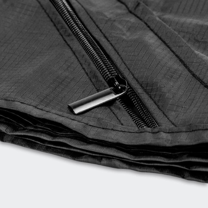 A black camping blanket featuring a zippered edge, showcasing the fabric texture and fold details.