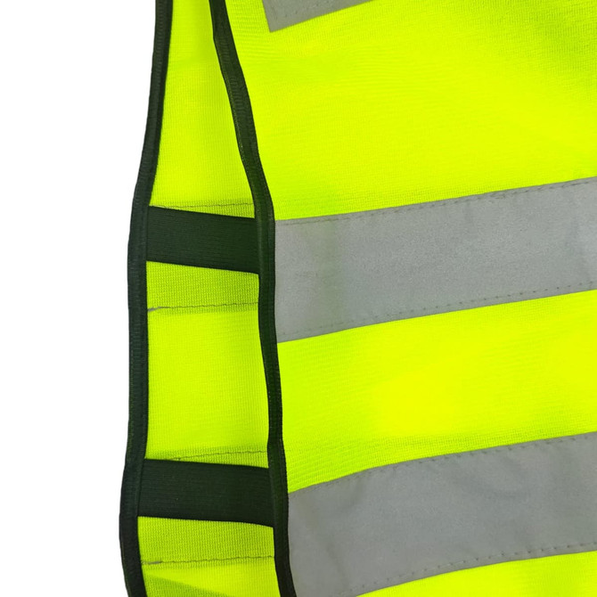 A bright yellow hi-vis reflective safety vest with grey reflective stripes and black borders. Features a logo.