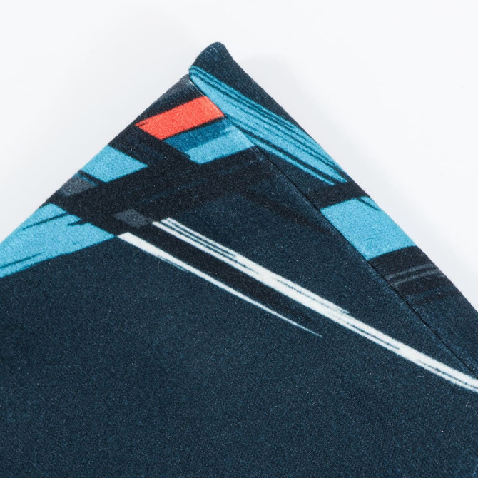 A brushed polyester wide headband in black with blue and red graphic patterns, featuring a subtle logo.