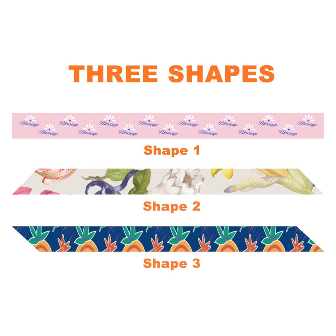 A patterned long scarf featuring floral and fruit designs in multiple shapes and colours, with a logo present.