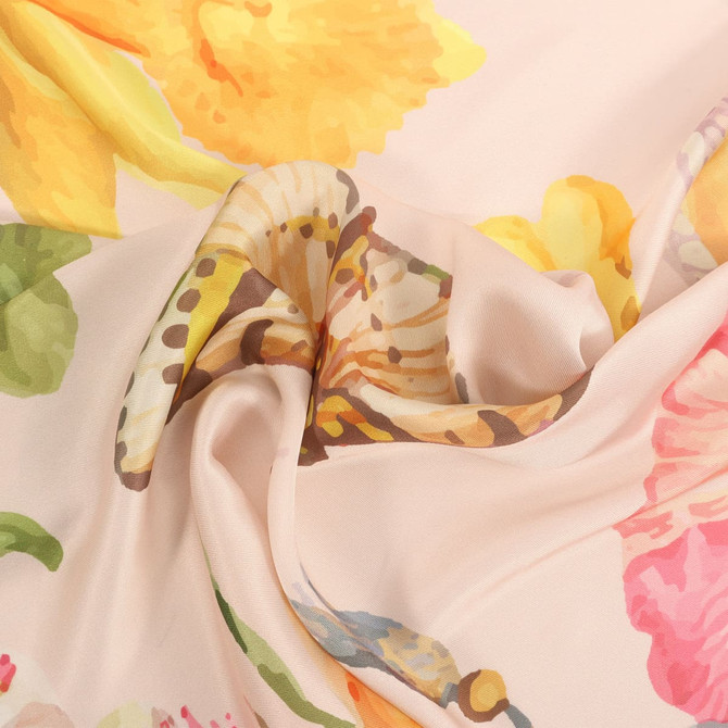 A Twill Weave Square Scarf featuring a floral design in shades of pink, yellow, and green on a light background.