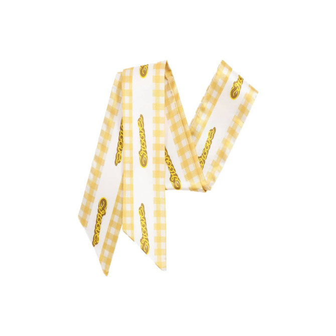 A satin narrow scarf featuring a yellow and white checkered pattern with a branding logo.