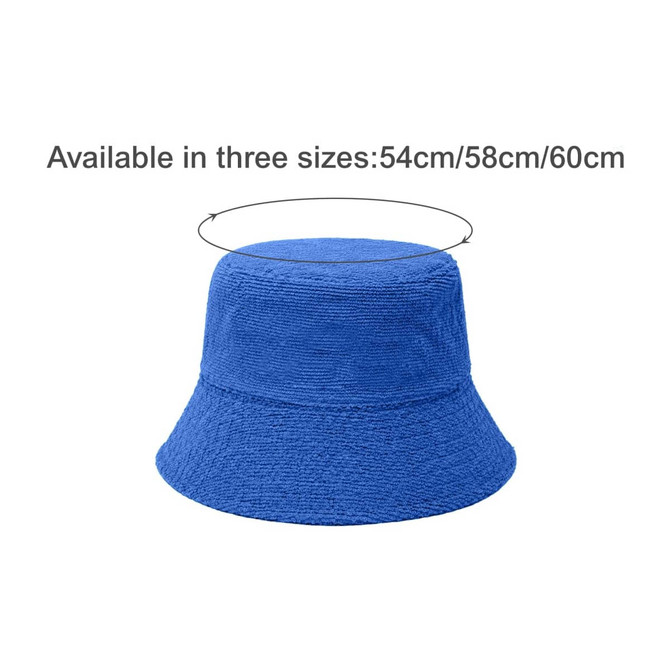 A blue reversible bucket hat with a textured finish and a round crown, featuring a logo.