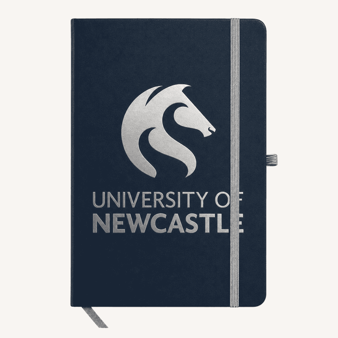 A navy A5 notebook with a branded logo on the cover and an elastic band closure.
