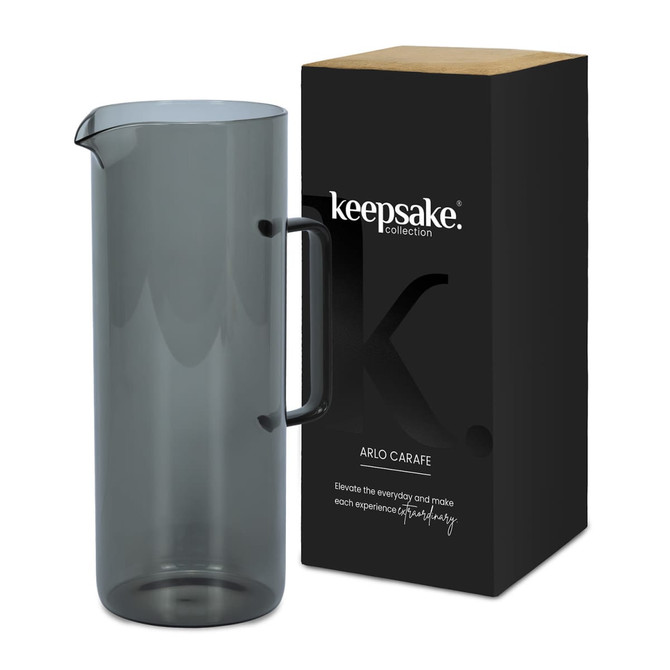 A drink bottle in a smoky grey colour, presented alongside a black box with branding.