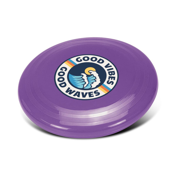 A purple frisbee featuring a circular logo with a bird and the text "Good Vibes, Good Waves."