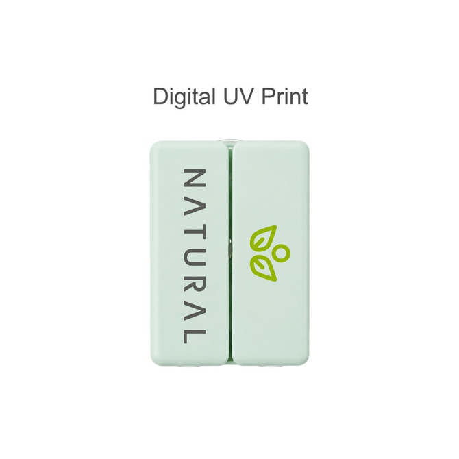 A folding pill box with seven compartments in light green, featuring a logo and printed text.