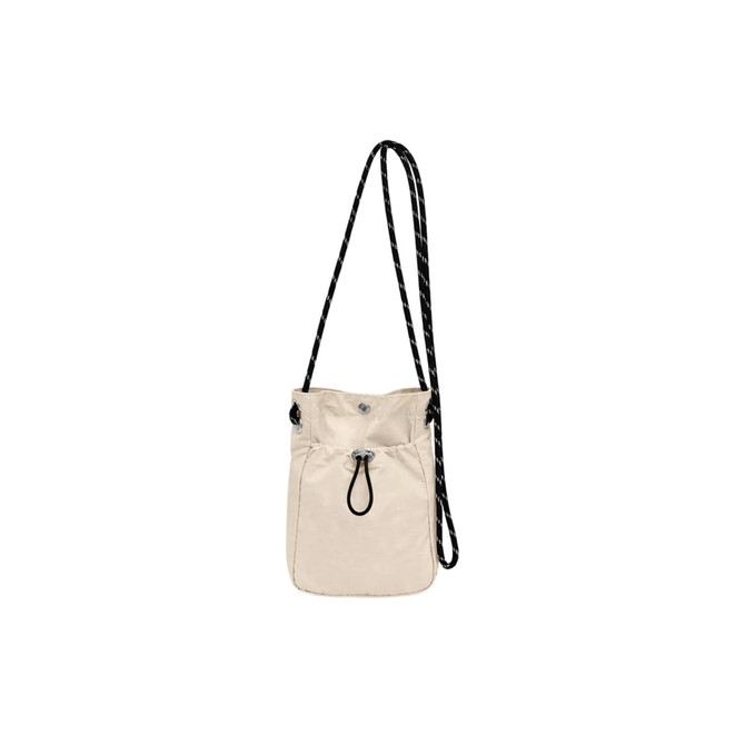 A lightweight shoulder phone bag in cream with a black adjustable strap and drawstring closure.