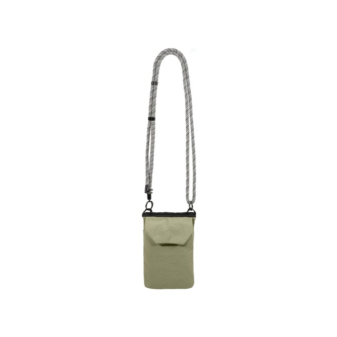 A minimalist crossbody phone bag in light green with a patterned strap and a small front pocket. It features a logo.