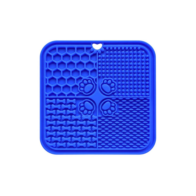 A blue, four-section dog enrichment lick mat featuring various textured designs, including honeycomb and paw prints.