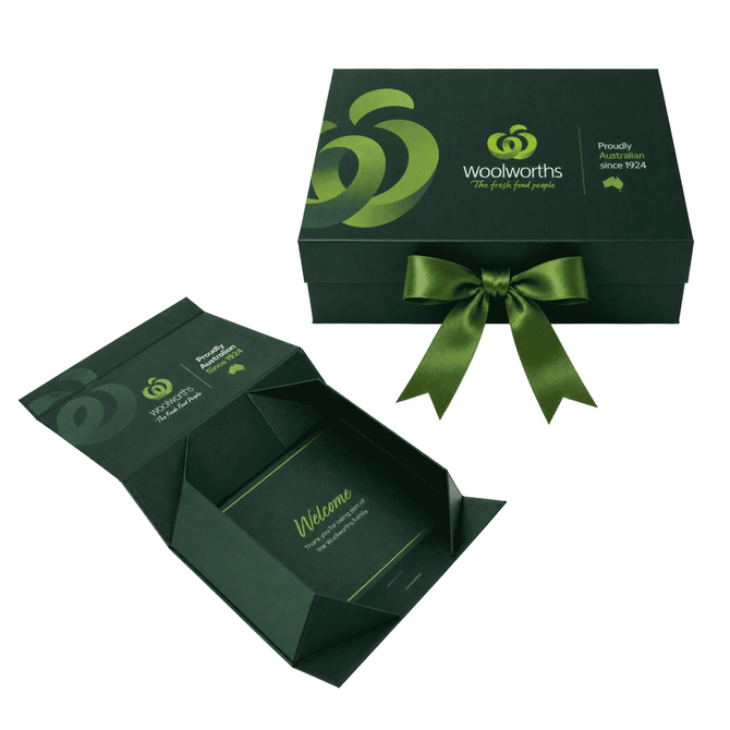 A medium, full-colour magnetic gift box in dark green with a matching ribbon and a branding logo.
