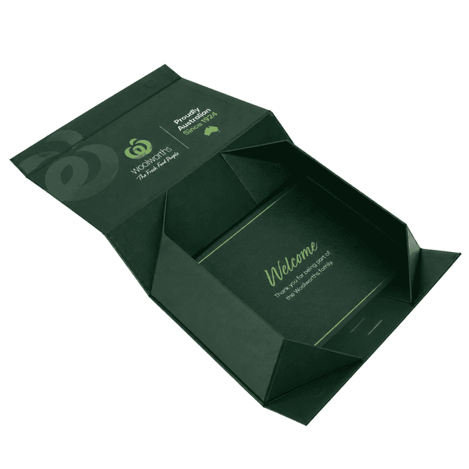 A green magnetic gift box with a ribbon, featuring an interior welcome message and a logo on the exterior.