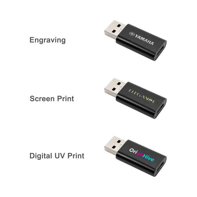 Three black USB data blockers with various printing options: engraving, screen print, and digital UV print.