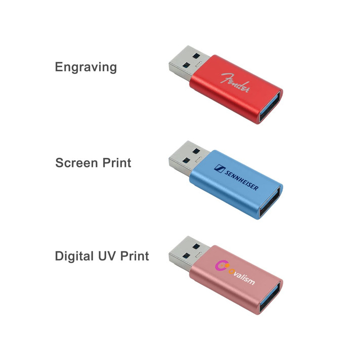 A red USB data blocker with engravings and prints. It features a sleek design in multiple colours.