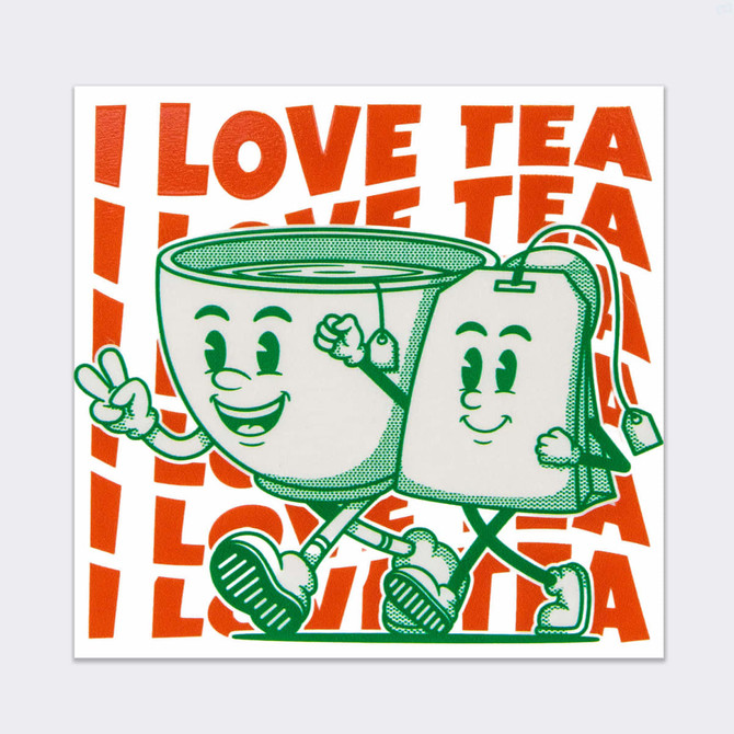 A green and white sticker featuring cheerful tea characters with orange text proclaiming love for tea. It has a logo.