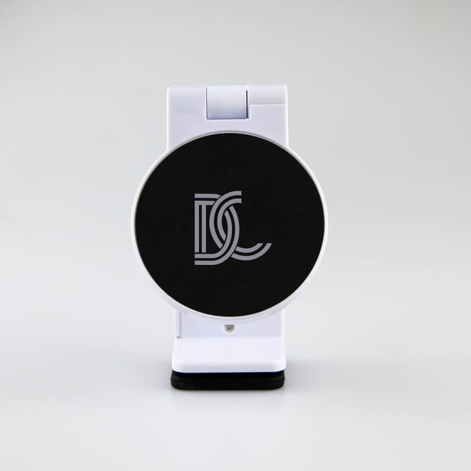 A white mobile phone stand with a black circular base featuring a logo. The design is sleek and modern.