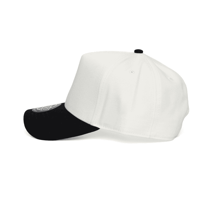 A two-tone cap featuring a black peak and a white crown, with a logo on the front.
