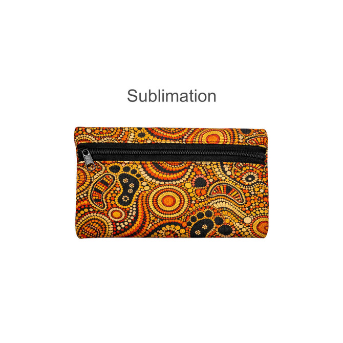 A small neoprene pencil pouch featuring a vibrant Aboriginal-inspired pattern in orange, black, and yellow with a zip closure.