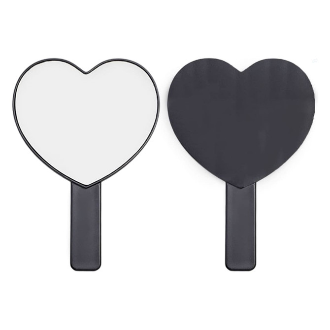 A heart-shaped handheld mirror with a black handle. The mirror is dual-sided, featuring reflective surfaces on both sides.