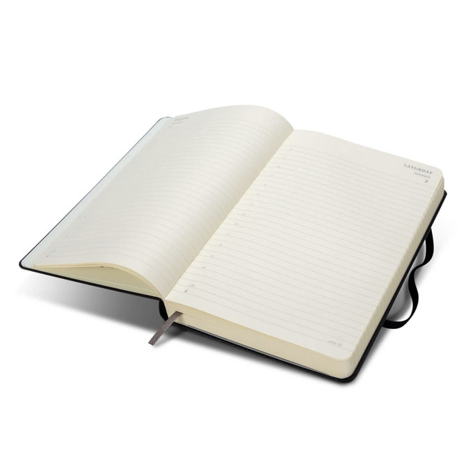 A black Moleskine 2027 Planner, featuring blank, lined pages and an elastic closure.