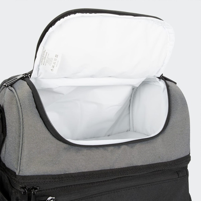 A cooler bag with a grey exterior and a white insulated interior, featuring a zippered opening.