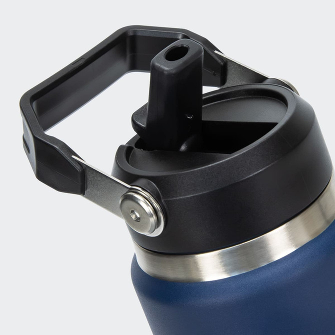 A drink bottle featuring a dark blue body, stainless steel base, and a black lid with a spout. It has a handle and a logo.