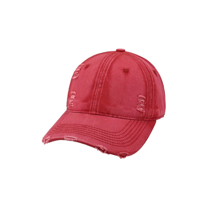 A vintage red baseball cap with distressed details and a curved brim, featuring a logo.