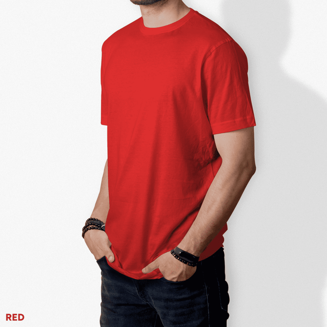 A red T-shirt displayed on a model, featuring short sleeves and a crew neckline. The model has their hands in pockets.