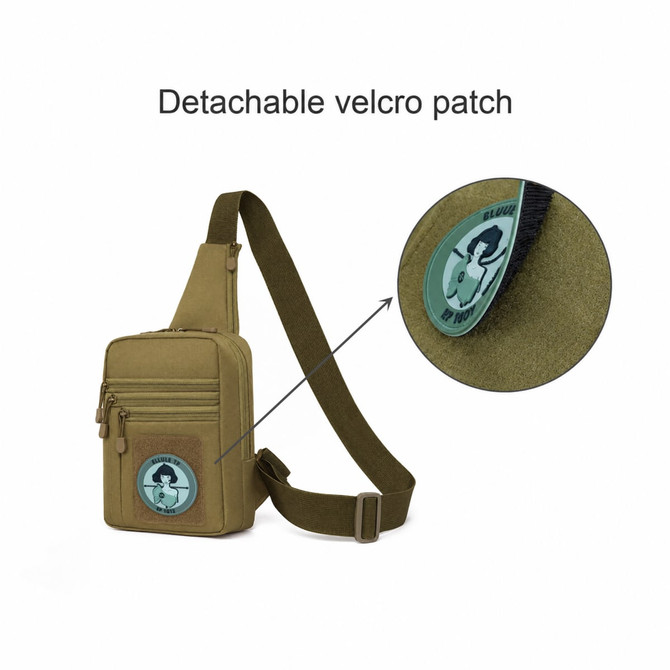 A tactical sling bag in olive green with a detachable velcro patch and adjustable strap. Features multiple zippered pockets.
