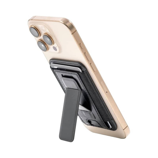 A phone stand with a black holder attached to a gold smartphone, featuring a back support for stability.