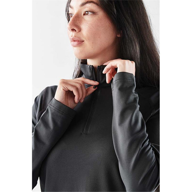 A model wears a black Women's Augusta 1/4 Zip Long Sleeve jumper featuring a mock neck and long sleeves.
