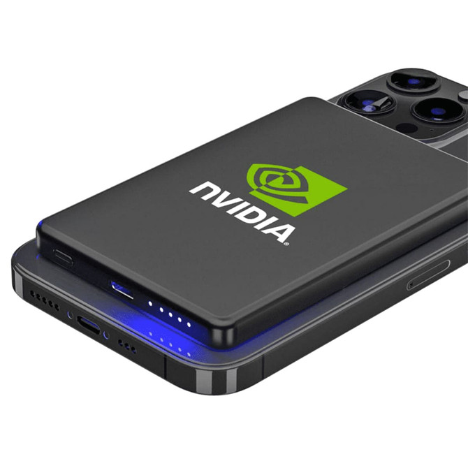 A slim black metal power bank with a logo, positioned on a smartphone, featuring blue LED indicators.