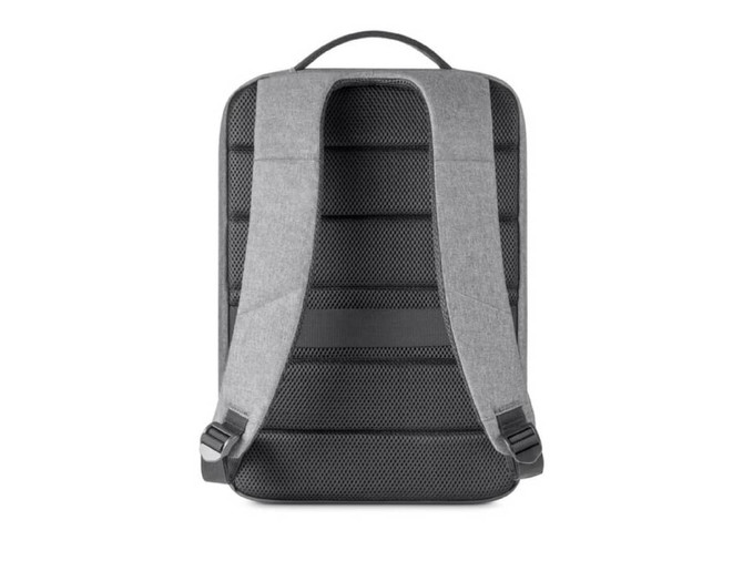 A grey backpack with adjustable straps and a padded back panel featuring a textured design.