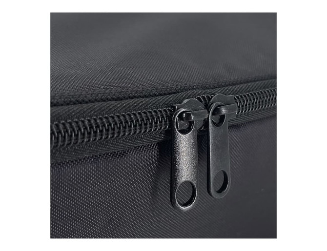 A close-up of a black insulated lunch bag featuring two black zipper pulls. The fabric has a textured finish.