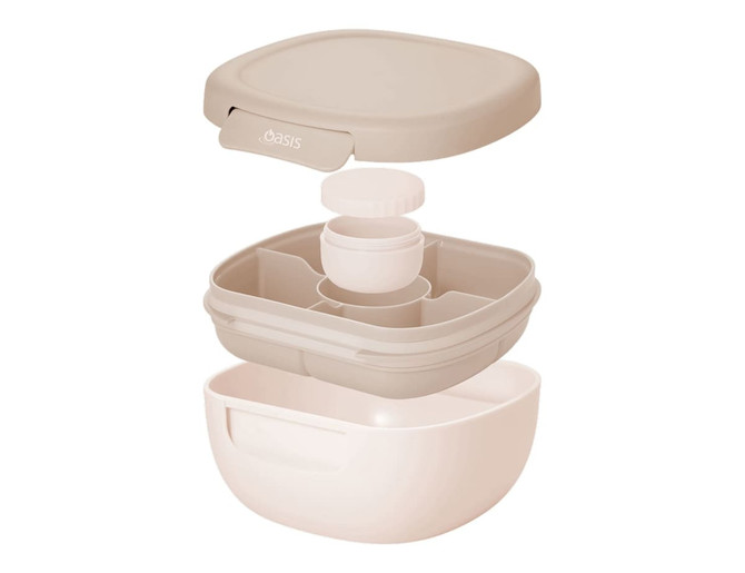 An expandable salad bowl in a light beige colour, featuring compartments and a lid, with a branding logo.