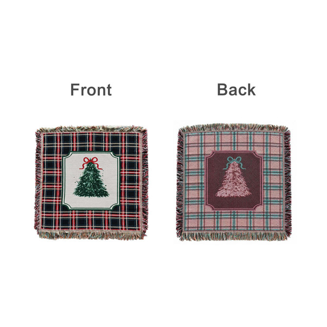 A tapestry blanket featuring a green Christmas tree design on a plaid background, with a coordinating plaid back.