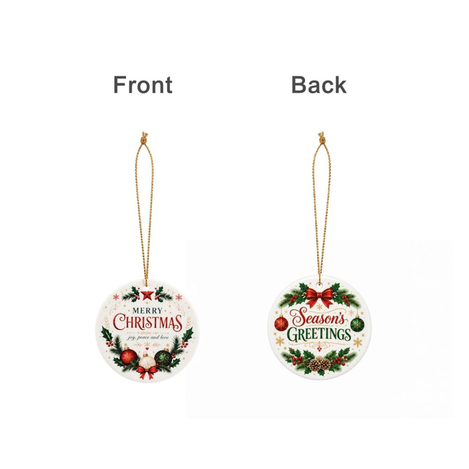 A ceramic ornament featuring a festive design of Christmas greetings in red and green on both sides. It has a gold string for hanging.