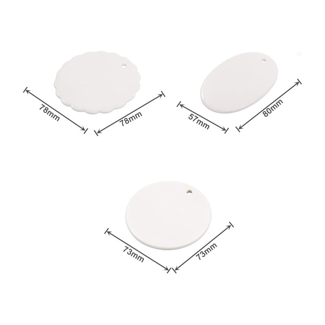 A set of three white ceramic ornaments in various shapes: scalloped, oval, and round, with measurement details included.